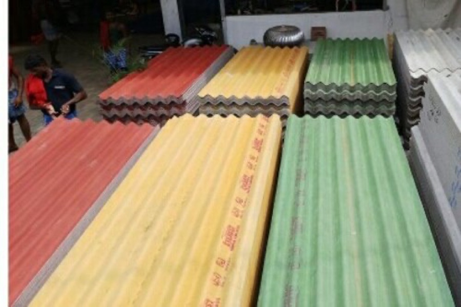 Coloured fibre cement sheets